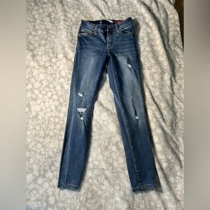 Teens blue jeans ripped